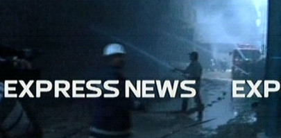 13 workers caught in karachi garment factory fire
