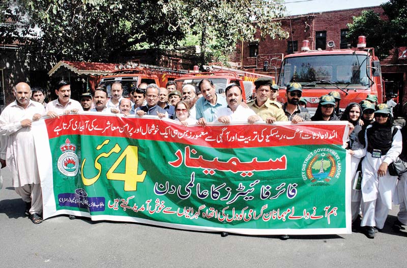 lahore city govt held an awareness walk in connection with the international fire fighters day left faisalabad city govt held a walk as well right photo nni inp