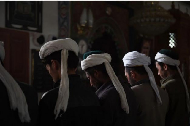 this photo taken on april 16 2015 shows uighur men praying in a mosque in hotan in china 039 s western xinjiang region photo afp this photo taken on april 16 2015 shows uighur men praying in a mosque in hotan in china 039 s western xinjiang region photo afp