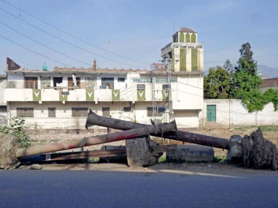 question of legality ad association objects to municipality tearing down billboards