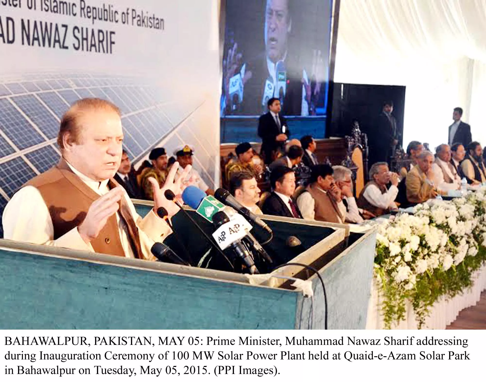 pm addressing the inauguration ceremony of 100 mw solar plant photo ppi pm addressing the inauguration ceremony of 100 mw solar plant photo ppi