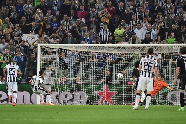 juventus 039 forward from argentina carlos tevez 2ndl scores a penalty kick during the uefa champions league semi final first leg football match juventus vs real madrid on may 5 2015 at the juventus stadium in turin photo afp juventus 039 forward from argentina carlos tevez 2ndl scores a penalty kick during the uefa champions league semi final first leg football match juventus vs real madrid on may 5 2015 at the juventus stadium in turin photo afp
