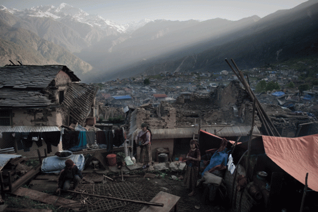 a villager constructing a makeshift tent for his family next to his destroyed house in the village of barpak in north central nepal nine days after a 7 8 magnitude earthquake struck the himalayan nation photo afp a villager constructing a makeshift tent for his family next to his destroyed house in the village of barpak in north central nepal nine days after a 7 8 magnitude earthquake struck the himalayan nation photo afp