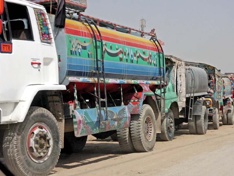 water tankers wait to fill up from a hydrant near safoora goth on wednesday with increasing demand tanker owners have increased their rates photo athar khan express
