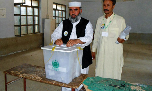 ji candidate izaz ul mulk afkari casts his vote in the by election photo inp