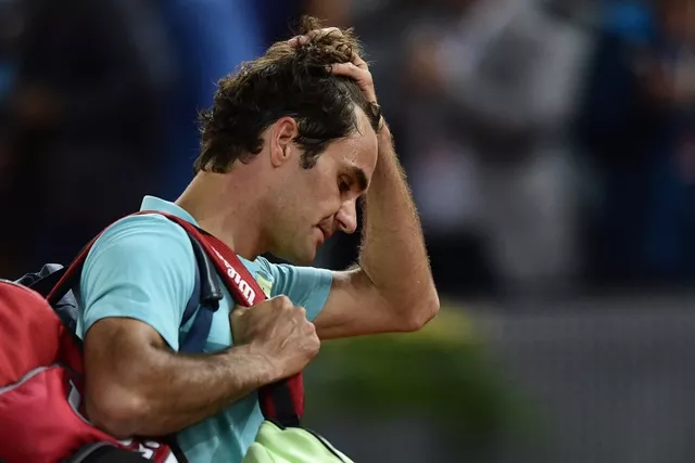 swiss tennis player roger federer reacts after loosing against australian tennis player nick kyrgios during the madrid open tournament at the caja magica magic box sports complex in madrid on may 6 2015 kyrgios won 6 7 2 7 7 6 7 5 7 6 14 12 photo afp swiss tennis player roger federer reacts after loosing against australian tennis player nick kyrgios during the madrid open tournament at the caja magica magic box sports complex in madrid on may 6 2015 kyrgios won 6 7 2 7 7 6 7 5 7 6 14 12 photo afp