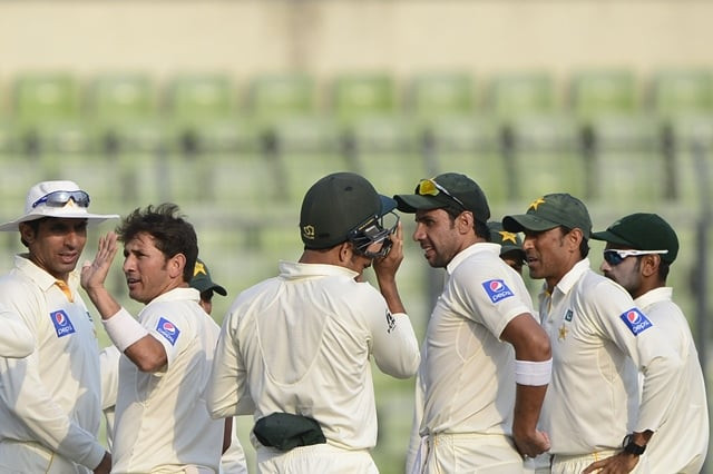 pakistan cricketer yasir shah 2l celebrates with his teammates after the dismissal of the bangladesh cricketer imrul kayes during the second day of the second cricket test match between bangladesh and pakistan at the sher e bangla national cricket stadium in dhaka on may 7 2015 photo afp pakistan cricketer yasir shah 2l celebrates with his teammates after the dismissal of the bangladesh cricketer imrul kayes during the second day of the second cricket test match between bangladesh and pakistan at the sher e bangla national cricket stadium in dhaka on may 7 2015 photo afp