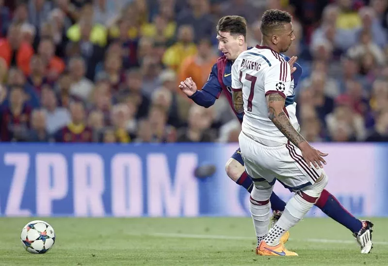 messi sits boateng on his backside on his way to scoring his second goal of the game photo afp messi sits boateng on his backside on his way to scoring his second goal of the game photo afp