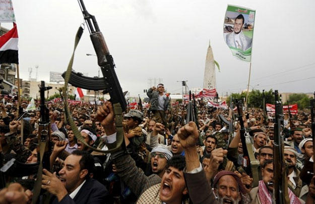 houthi followers hold up their weapons during a demonstration against the saudi led air strikes in sanaa may 8 2015 photo reuters