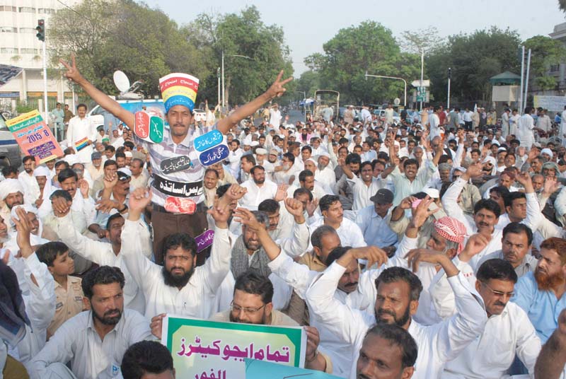 protesters from the muttahida asatza mahaz also demand an end to non academic duties for school teachers photo shafiq malik
