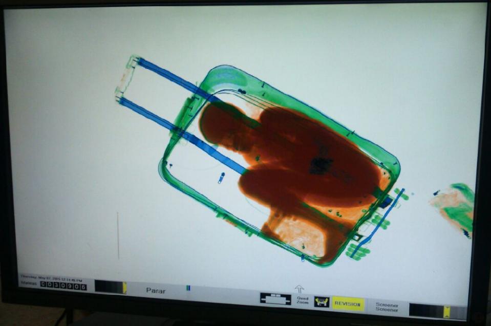 civil guard spokesperson says the minor was found in terrible state when the suitcase was opened photo afp