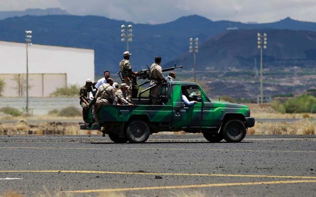 huuthi rebels inspect damage done by air strikes by the saudi led coalition at the international airport in sanaa on may 5 2015 photo afp