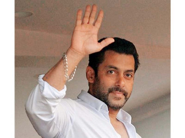 salman waves to his fans from the balcony of his apartment expressing gratitude for their support during his trying times photo file salman waves to his fans from the balcony of his apartment expressing gratitude for their support during his trying times photo file