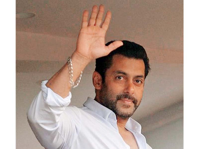 salman waves to his fans from the balcony of his apartment expressing gratitude for their support during his trying times photo file