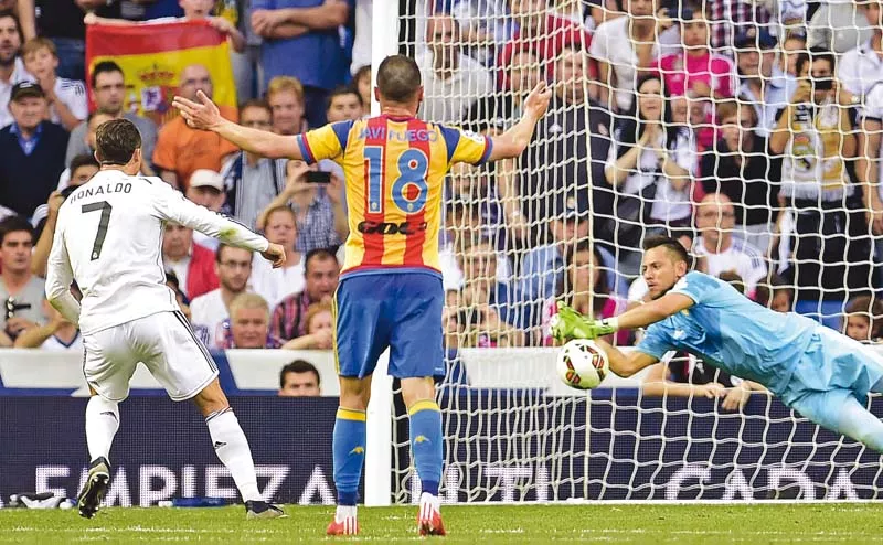 diego alves stops a penalty from cristiano ronaldo on the brink of half time ensuring the visitors kept their 2 0 lead at the break photo afp diego alves stops a penalty from cristiano ronaldo on the brink of half time ensuring the visitors kept their 2 0 lead at the break photo afp