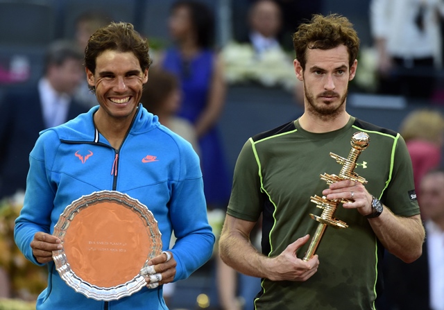 spanish tennis player rafael nadal l and open winner scottish tennis player andy murray pose on the podium of the men final of madrid open tournament at the caja magica magic box sports complex in madrid on may 10 2015 murray won 6 3 6 2 photo afp