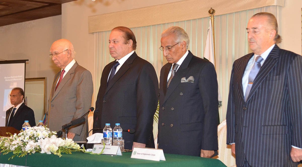 prime minister nawaz sharif along with advisors sartaj aziz left and tariq fatemi left observes one minute silence at the condolence ceremony on monday may 11 2015 in islamabad photo pid