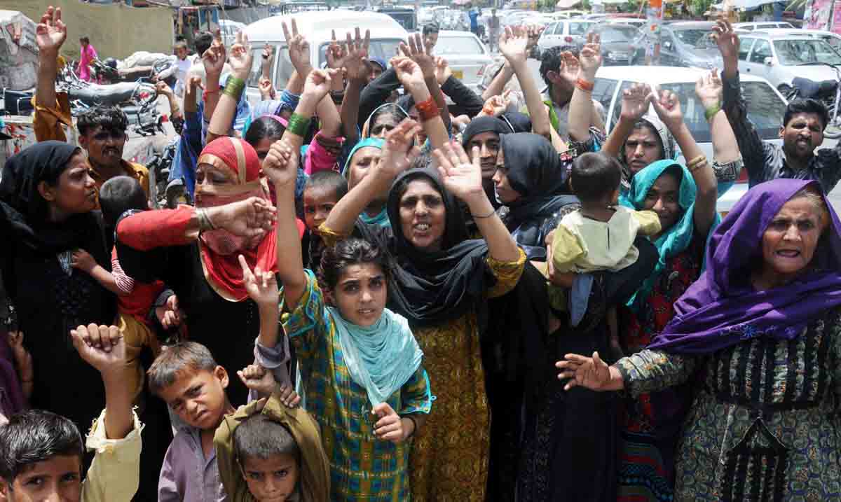 the protesters accused an officer of the korangi industrial area police station of arresting these men only to release them after taking bribes from the families photo mohammad azeem experss