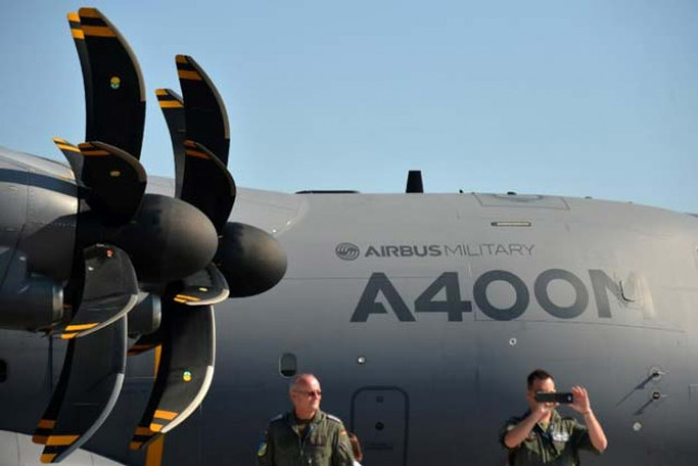 airbus said monday it would carry on with test flights of its a400m military transport plane despite the crash of one of the aircraft in spain that killed four employees photo afp airbus said monday it would carry on with test flights of its a400m military transport plane despite the crash of one of the aircraft in spain that killed four employees photo afp