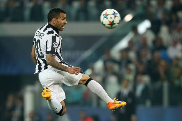 a file photo of juventus player carlos tevez in the first leg of the champions league match against real madrid photo afp a file photo of juventus player carlos tevez in the first leg of the champions league match against real madrid photo afp