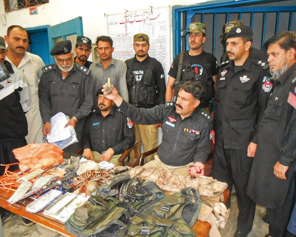 police display weapons seized from the site photo express police display weapons seized from the site photo express