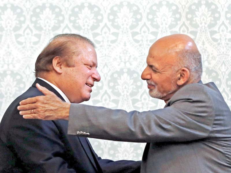 afghan president ashraf ghani embraces prime minister nawaz sharif after a news conference in kabul photo reuters