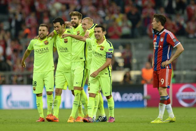 bayern munich 039 s polish forward robert lewandowski r looks on as barcelona 039 s players celebrate after the uefa champions league semi final second leg football match fc bayern munich vs fc barcelona in munich southern germany on may 12 2015 bayern munich won the match 3 2 but barcelona qualified for the champions league final photo afp bayern munich 039 s polish forward robert lewandowski r looks on as barcelona 039 s players celebrate after the uefa champions league semi final second leg football match fc bayern munich vs fc barcelona in munich southern germany on may 12 2015 bayern munich won the match 3 2 but barcelona qualified for the champions league final photo afp