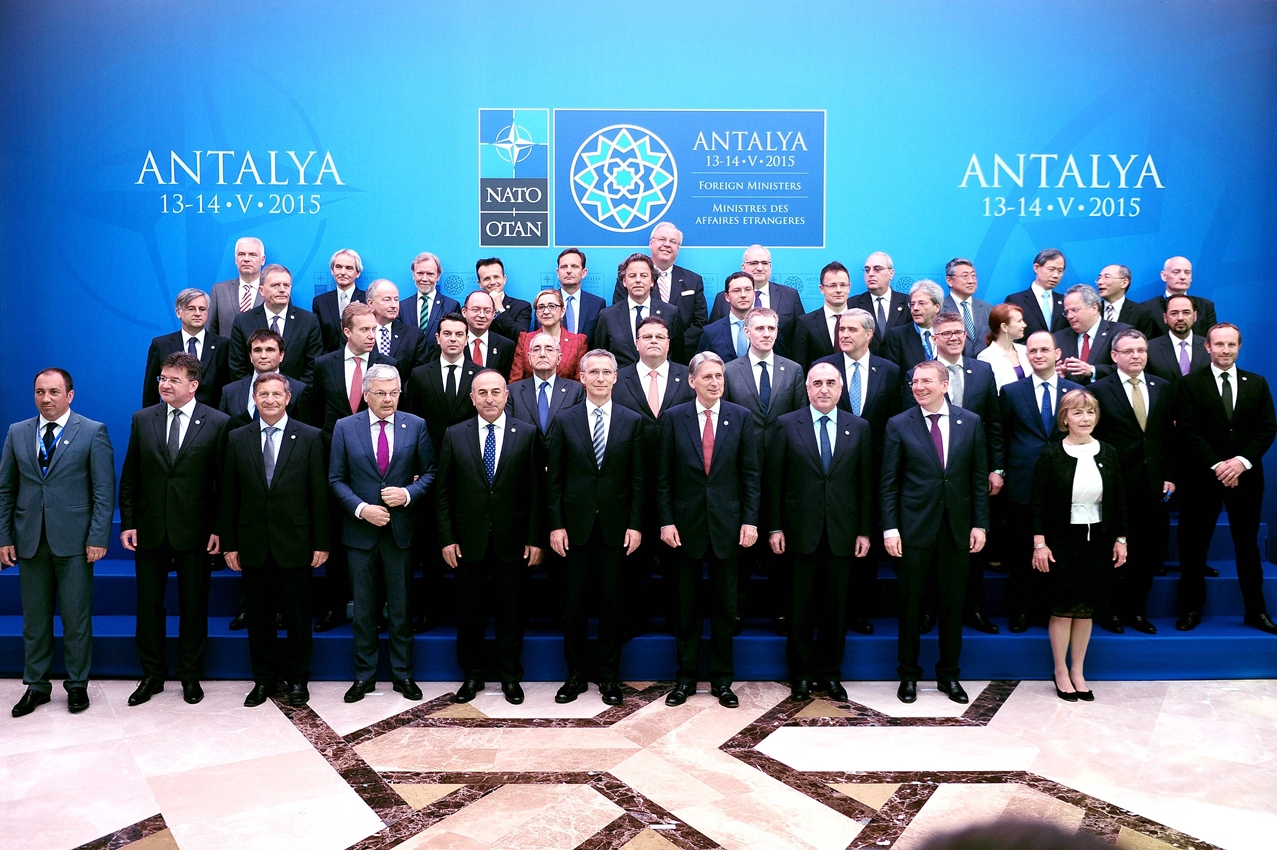 front row secretary general of nato jens stoltenberg 6th l turkish foreign minister mevlut cavusoglu 5th l and british foreign secretary philip hammond 4th r nato foreign ministers and ambassadors of nato member states pose at nato foreign minister 039 s meeting on may 13 2015 in antalya photo afp