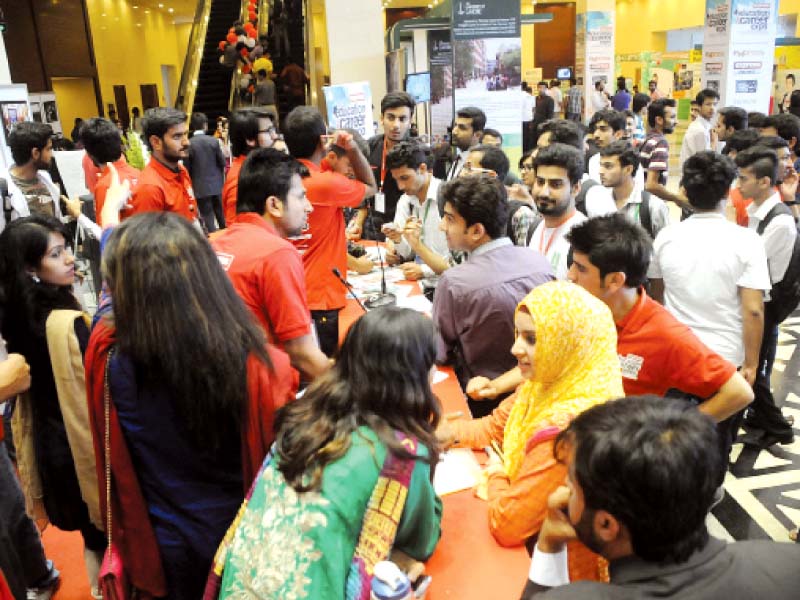 a large number of students thronged the third express education and career expo that kicked off in islamabad on wednesday left information minister pervaiz rashid who inaugurated the event visited different stalls photo waseem nazir express