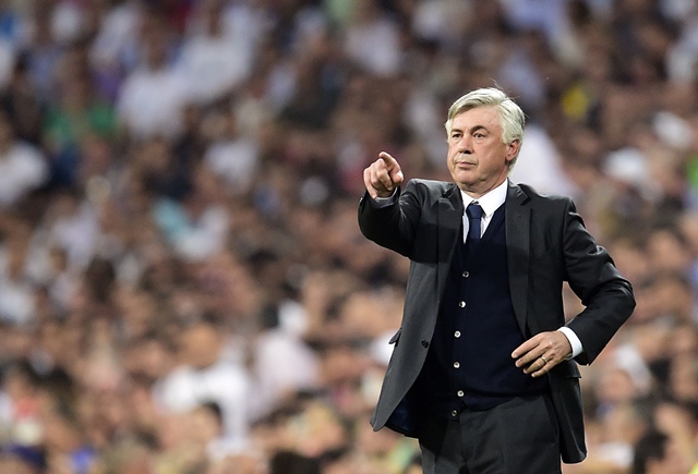 real madrid 039 s italian coach carlo ancelotti gestures during the uefa champions league semi final second leg football match real madrid fc vs juventus at the santiago bernabeu stadium in madrid on may 13 2015 photo afp