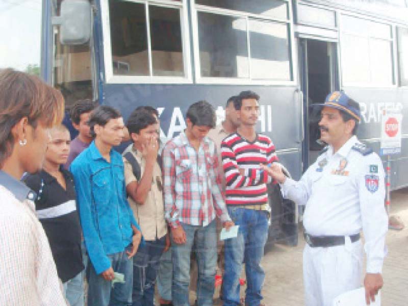 a traffic police officer speaks to underage drivers after their vehicles were impounded by the dept the police have initiated a campaign against underage drivers photo courtesy rahnuma traffic police facebook page