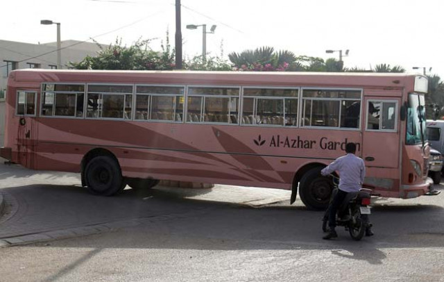 as the city comes to terms with the loss of 45 men and women of the ismaili community details unfurl on the lives of the innocent people who boarded the pink alazhar gardens bus photo afp as the city comes to terms with the loss of 45 men and women of the ismaili community details unfurl on the lives of the innocent people who boarded the pink alazhar gardens bus photo afp