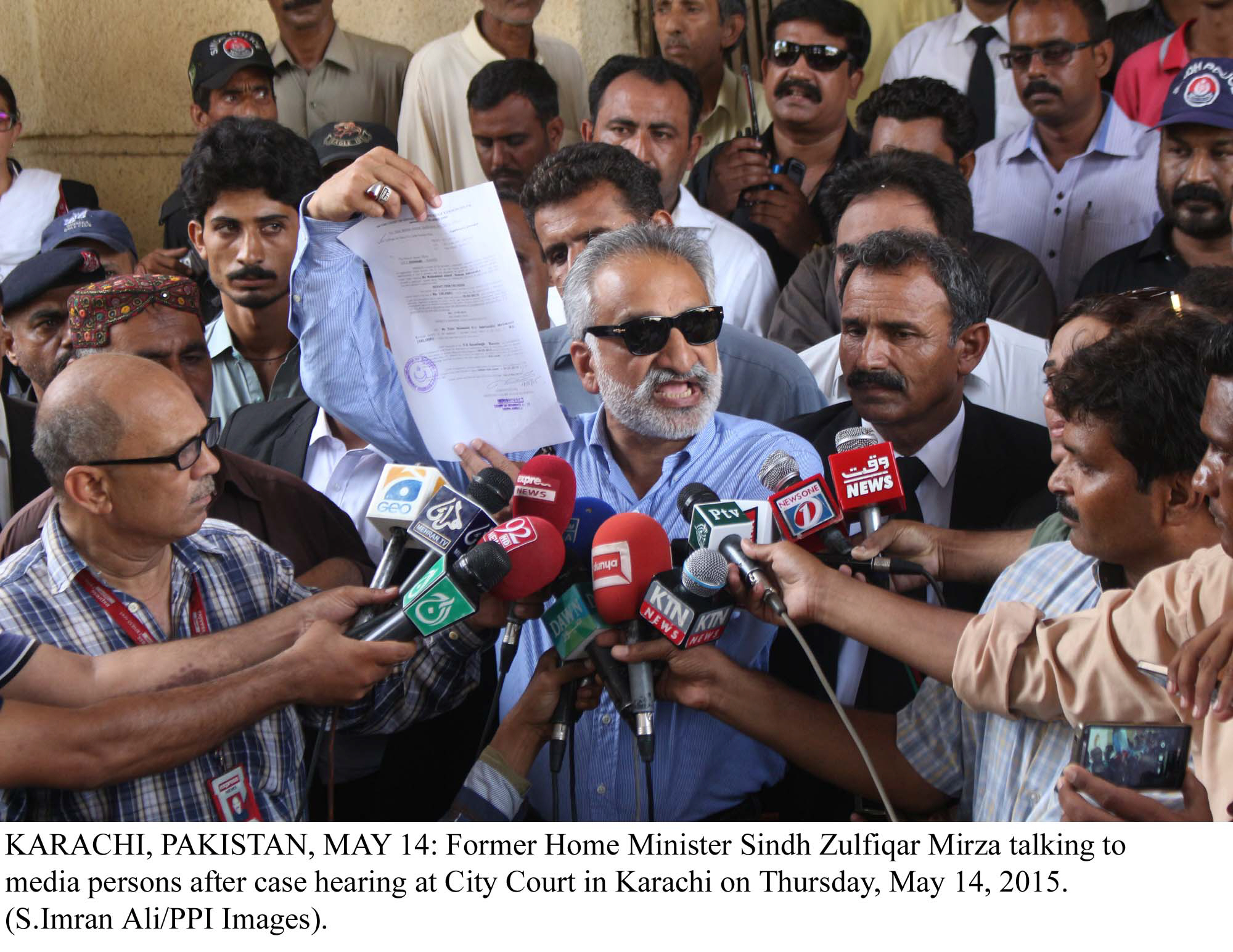 zulfiqar mirza talking to media persons after case hearing at city court in karachi photo ppi