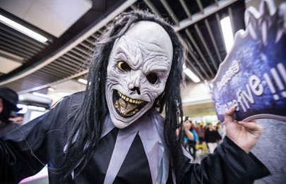 beijing police warn strange outfits on subway may cause stampedes