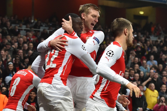 a file photo of arsenal players celebrating a goal in a premier league match photo afp