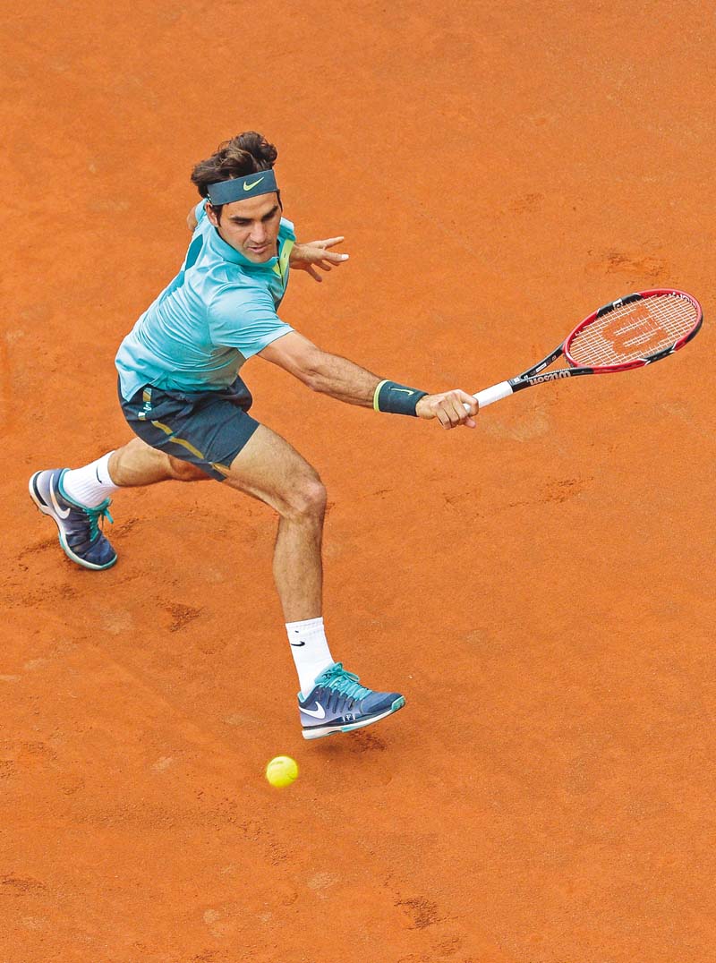 federer admitted his easy win over berdych had left him feeling comfortable with his progress on the red dirt photo afp