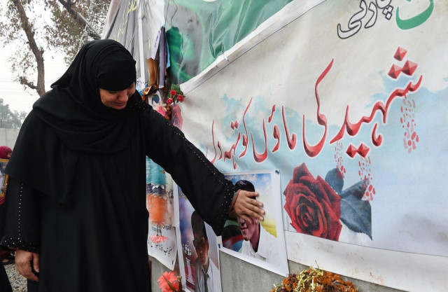 a mother of a schoolchild killed in a taliban attack on the army public school aps reacts during a protest against delays in the investigation in peshawar on february 7 2015 photo afp a mother of a schoolchild killed in a taliban attack on the army public school aps reacts during a protest against delays in the investigation in peshawar on february 7 2015 photo afp