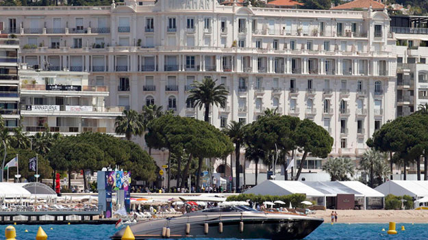 a general view shows the miramar cannes croisette hotel and beaches on the croisette during the 68th cannes film festival in cannes photo reuters
