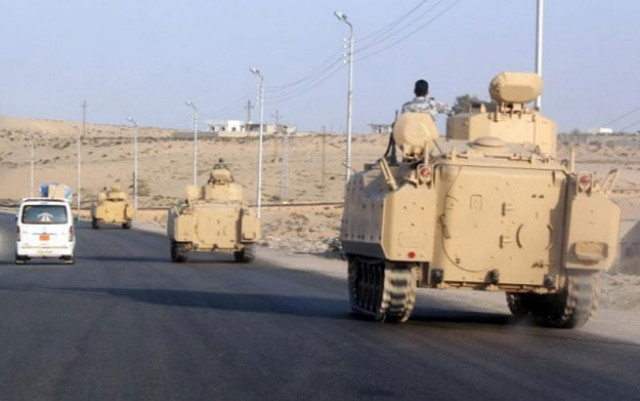 a 2011 file photo of a convoy of egyptian armoured vehicles moves along a road in el arish on the sinai peninsula on august 13 2011 photo afp a 2011 file photo of a convoy of egyptian armoured vehicles moves along a road in el arish on the sinai peninsula on august 13 2011 photo afp