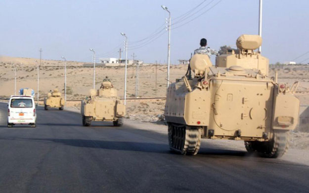 a 2011 file photo of a convoy of egyptian armoured vehicles moves along a road in el arish on the sinai peninsula on august 13 2011 photo afp