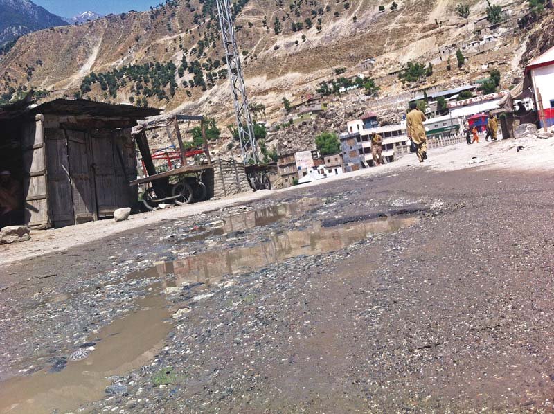 a part of karakoram highway where water is standing in a pothole photo courtesy shamsur rehman