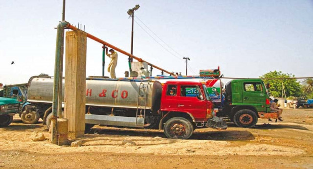 men fill water tankers from a connection in karachi the city s water crisis has worsened recently leaving many of the residents dependent upon services such as these tankers photo courtesy farhan anwar men fill water tankers from a connection in karachi the city s water crisis has worsened recently leaving many of the residents dependent upon services such as these tankers photo courtesy farhan anwar