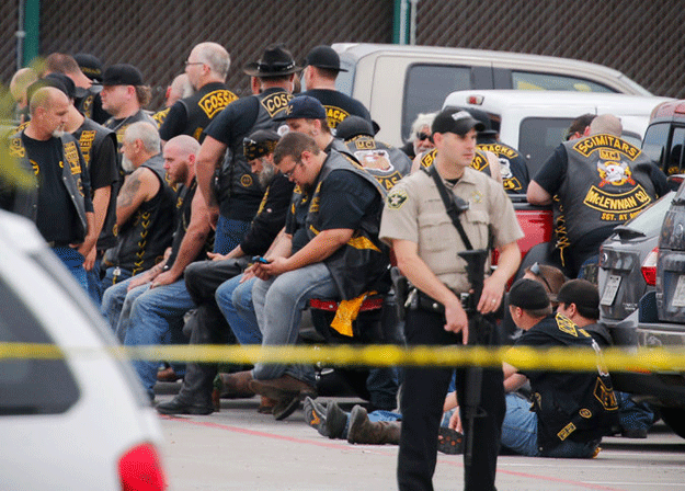 as many as 18 people wounded from gunshot and stab wounds while more than 100 weapons collected from the scene photo ap