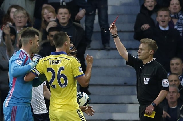 chelsea 039 s english defender john terry 3l remonstrates with referee mike jones as he shows chelsea 039 s spanish midfielder cesc fabregas 2l the red card during the english premier league football match between west bromwich albion and chelsea at the hawthorns in west bromwich central england on may 18 2015 photo afp