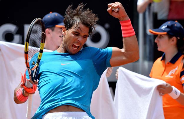 spanish tennis player rafael nadal celebrates after winning against us john isner during the atp tennis open tournament at the foro italico on may 14 2015 in rome photo afp