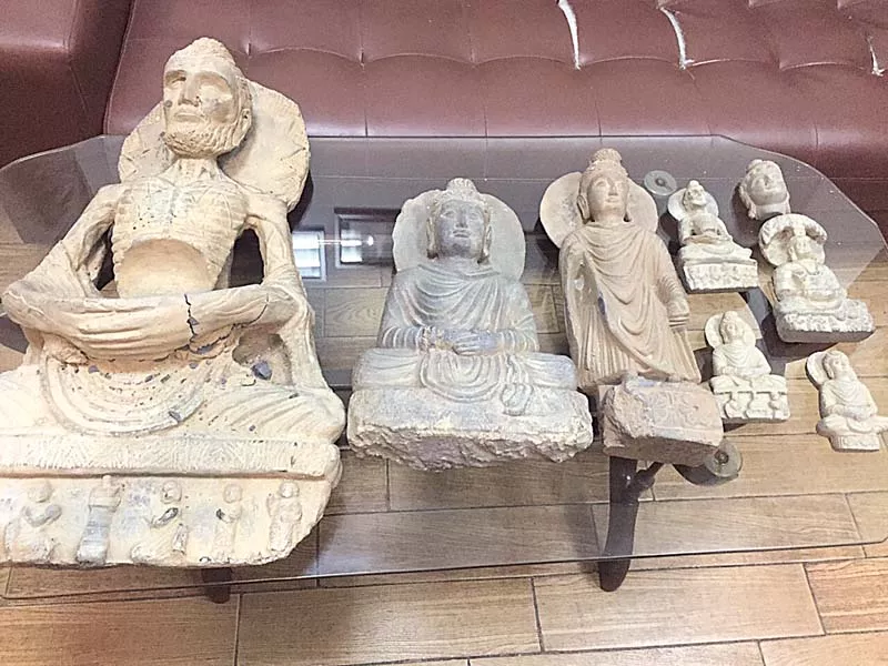 one of the statues was an original gandhara era artefact photo express one of the statues was an original gandhara era artefact photo express