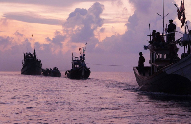 acehnese fishermen r in boats tow a boat of rohingya migrants in their boat l off the coast near the city of geulumpang in indonesia 039 s east aceh district of aceh province at dawn before being rescued on may 20 2015 hundreds of starving boatpeople were rescued off indonesia on may 20 as myanmar for the first time offered to help ease a regional migrant crisis blamed in part on its treatment of the ethnic rohingya minority photo afp acehnese fishermen r in boats tow a boat of rohingya migrants in their boat l off the coast near the city of geulumpang in indonesia 039 s east aceh district of aceh province at dawn before being rescued on may 20 2015 hundreds of starving boatpeople were rescued off indonesia on may 20 as myanmar for the first time offered to help ease a regional migrant crisis blamed in part on its treatment of the ethnic rohingya minority photo afp