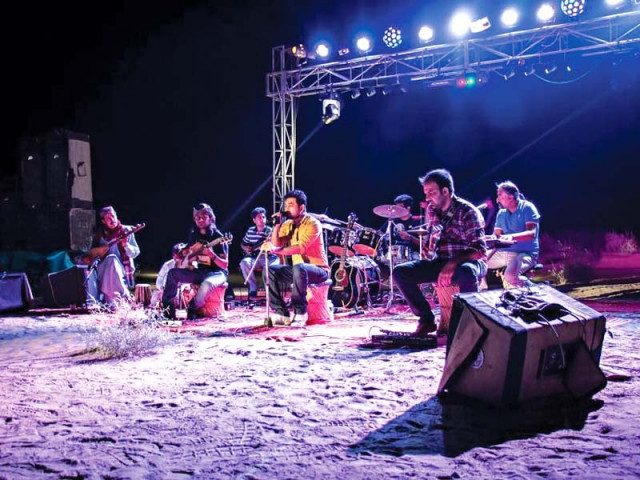 the band brought the entire sound and lighting set up from jamshoro to tharparkar and performed while sitting on sand dunes photo file the band brought the entire sound and lighting set up from jamshoro to tharparkar and performed while sitting on sand dunes photo file