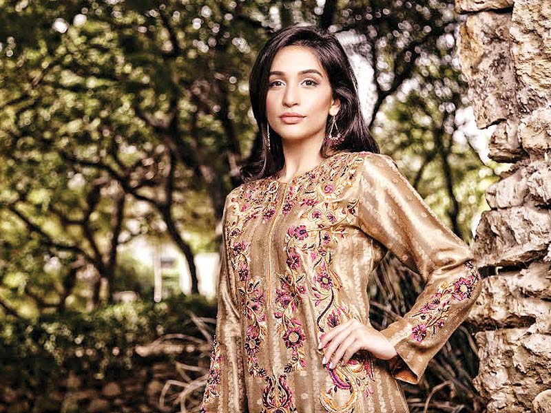 exuding femininity jahangir s work includes embroidered silk kurtas and pr t kurtas in both bright and muted tones photos publicity