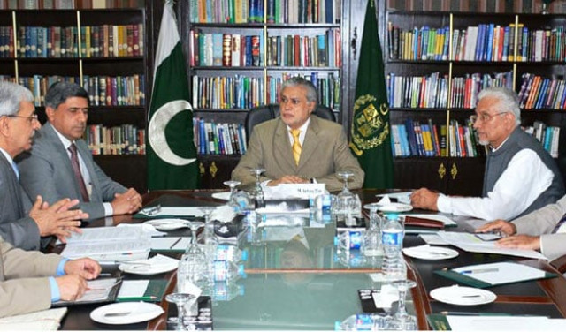 federal minister for finance ishaq dar chairing a meeting to review the progress on k2 and k3 energy project on wednesday photo pid